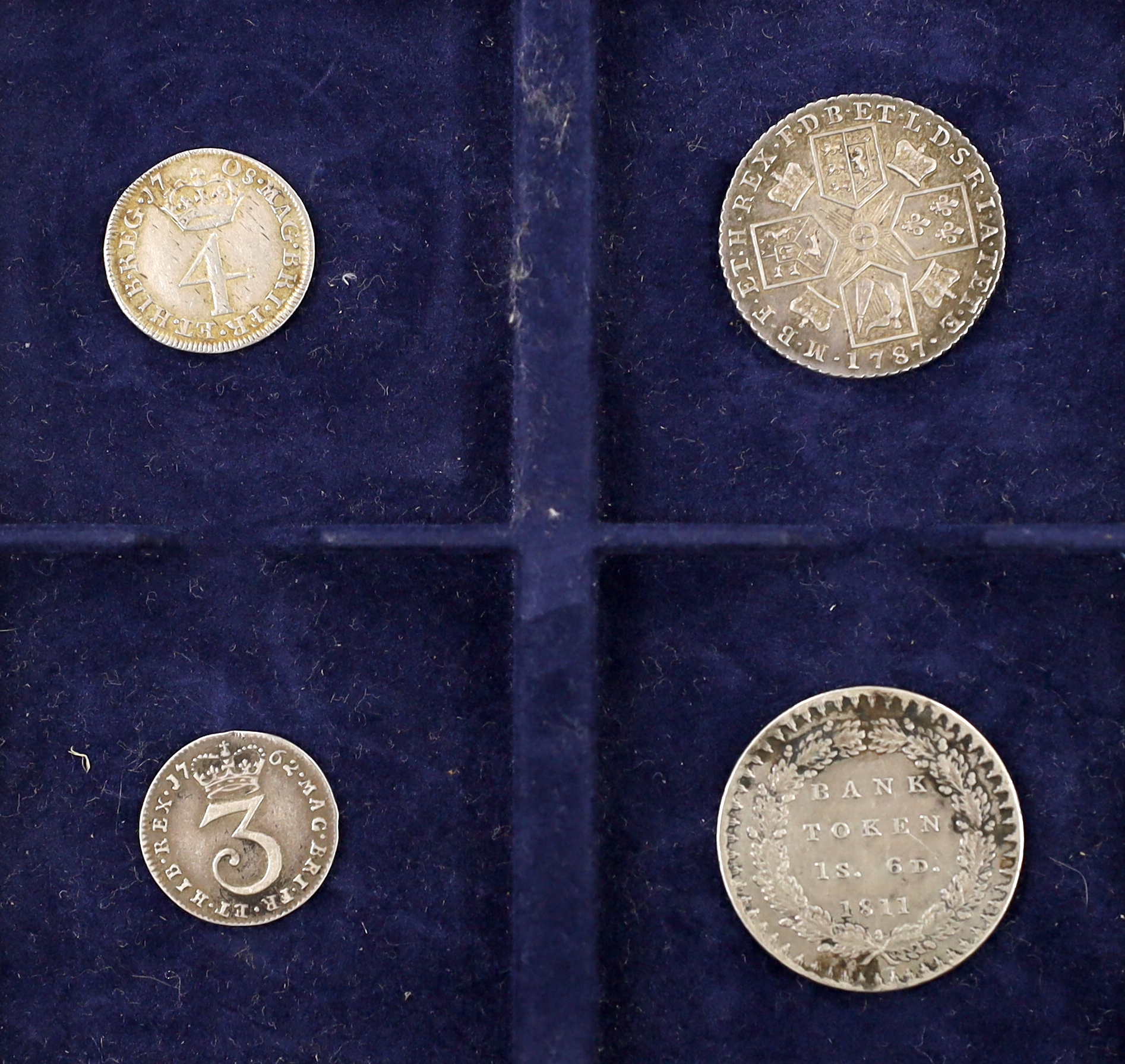 Anne to George III British silver coins, Anne maundy 4d (part of S3599), haymarking otherwise good VF, George III shilling 1787 (S3743), edge nick otherwise about EF, George III 3d 1762 (S3753), VF, and eighteen pence ba